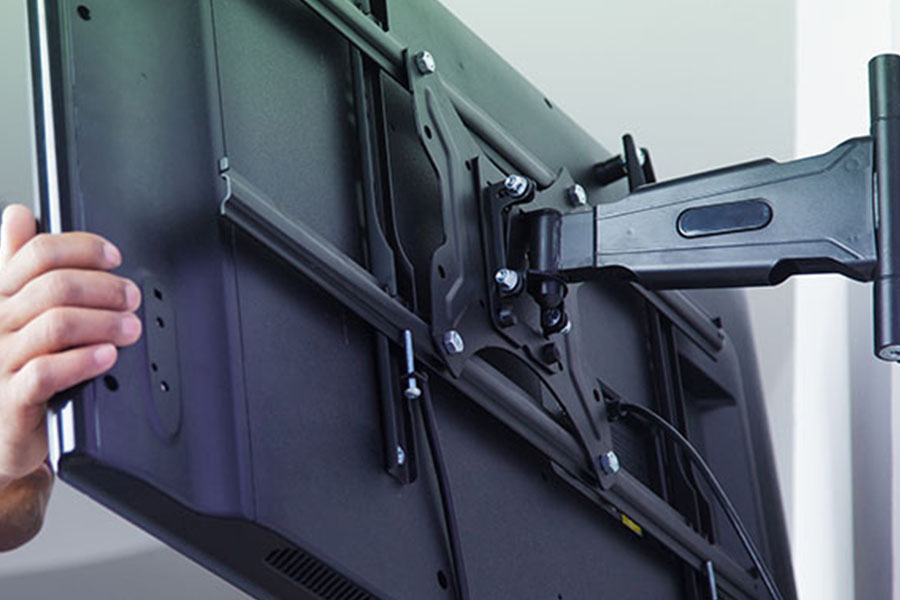 TV wall mount installation in progress